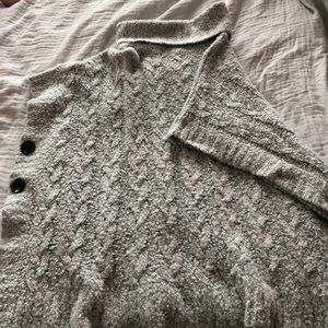 Grey poncho w/ black buttons & turtle neck